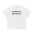 Em-dash slogan cotton tee — Black on white