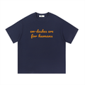Em-dash slogan cotton tee — Orange on navy blue