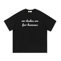 Em-dash slogan cotton tee — White on black